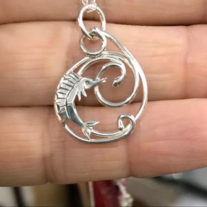 Tiny sterling silver sword fish jumping